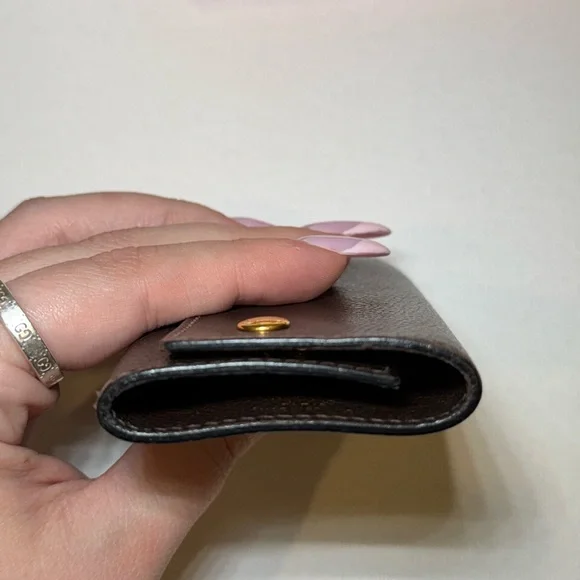 Hermès Black Leather Key Holder with Gold Accents - Picture 8 of 10